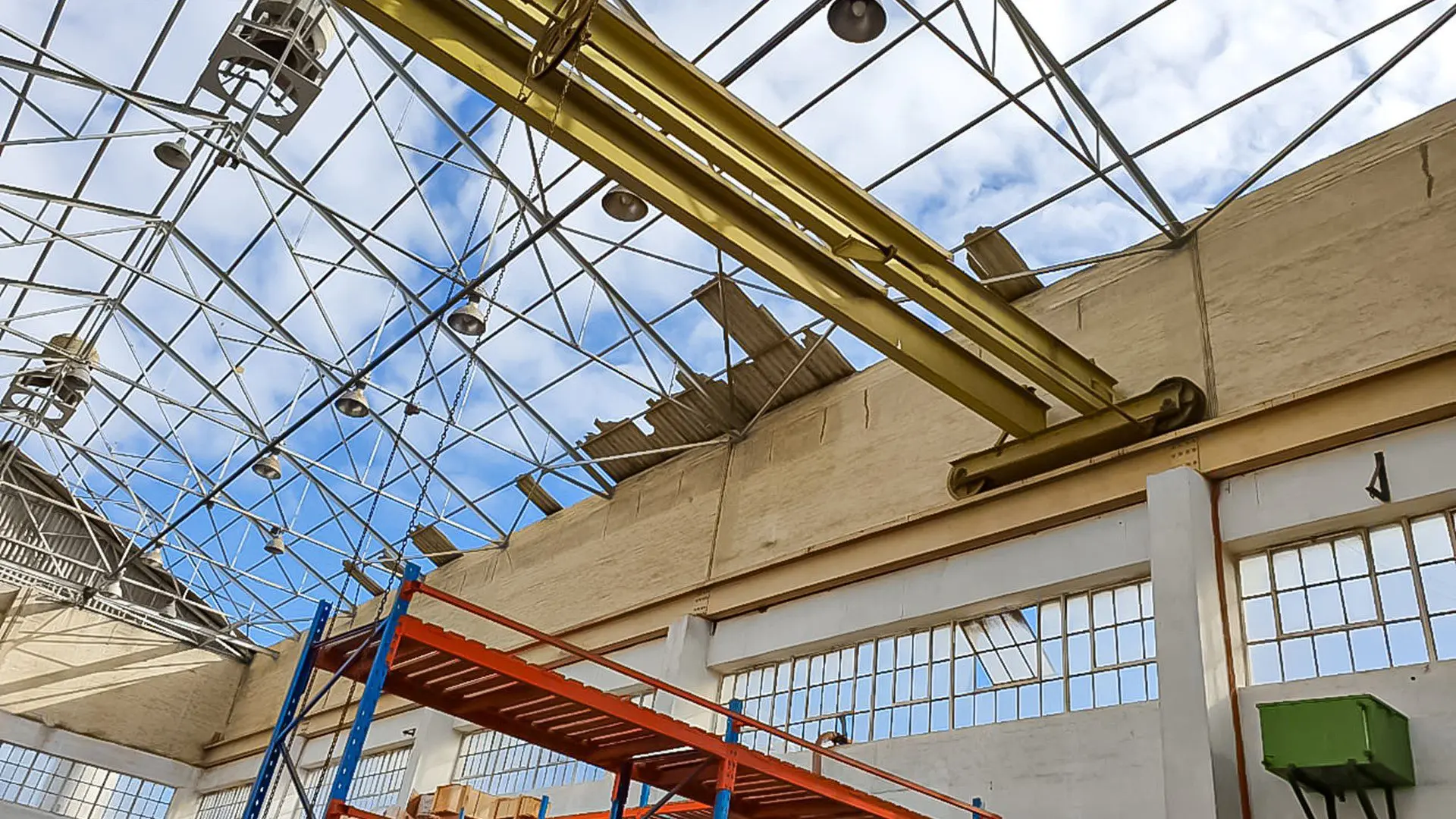 Sicon Group workers in protective gear safely removing asbestos sheeting from an industrial site in Gauteng