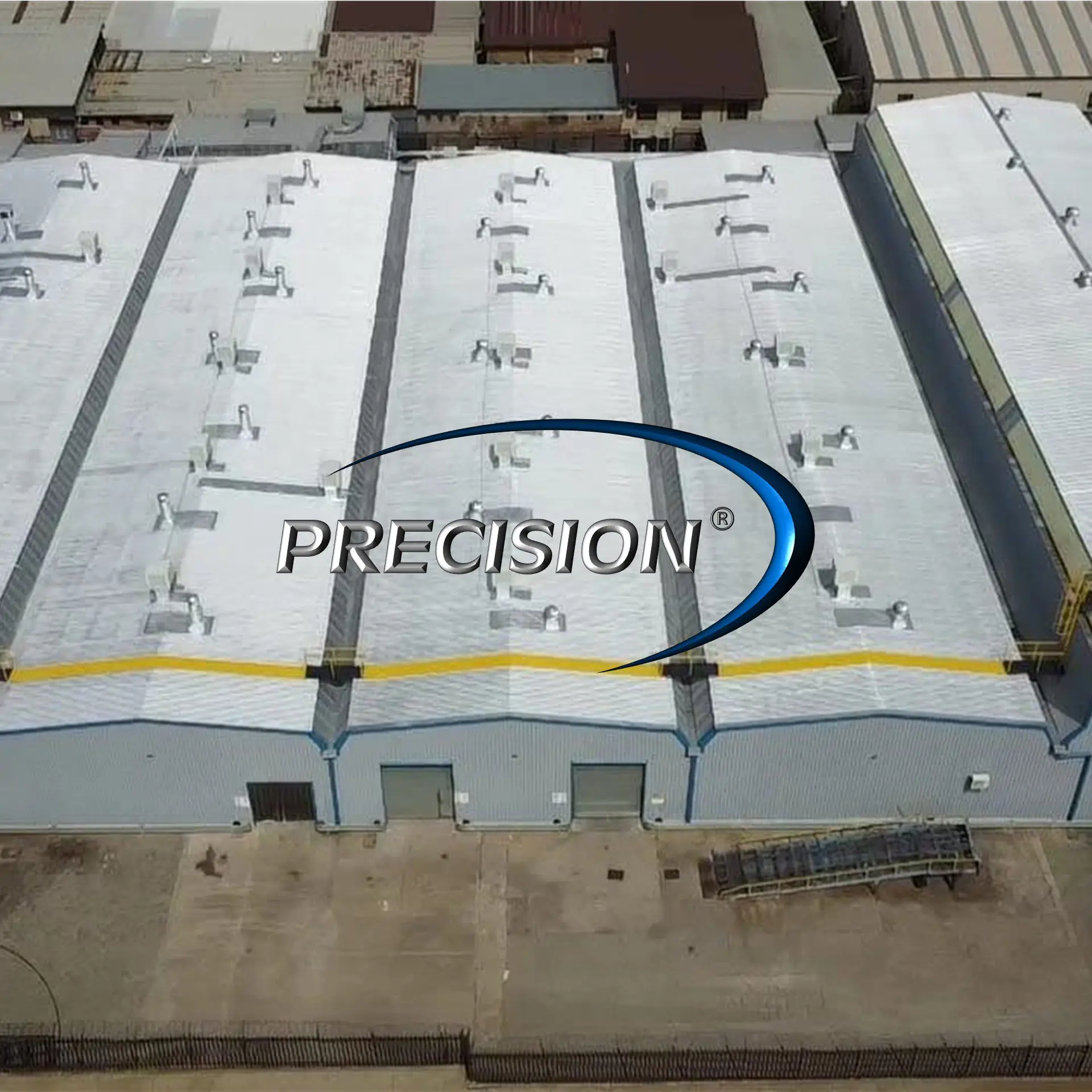 Aerial view of the Precision Valve facility with its fully restored white roof by Sicon Group