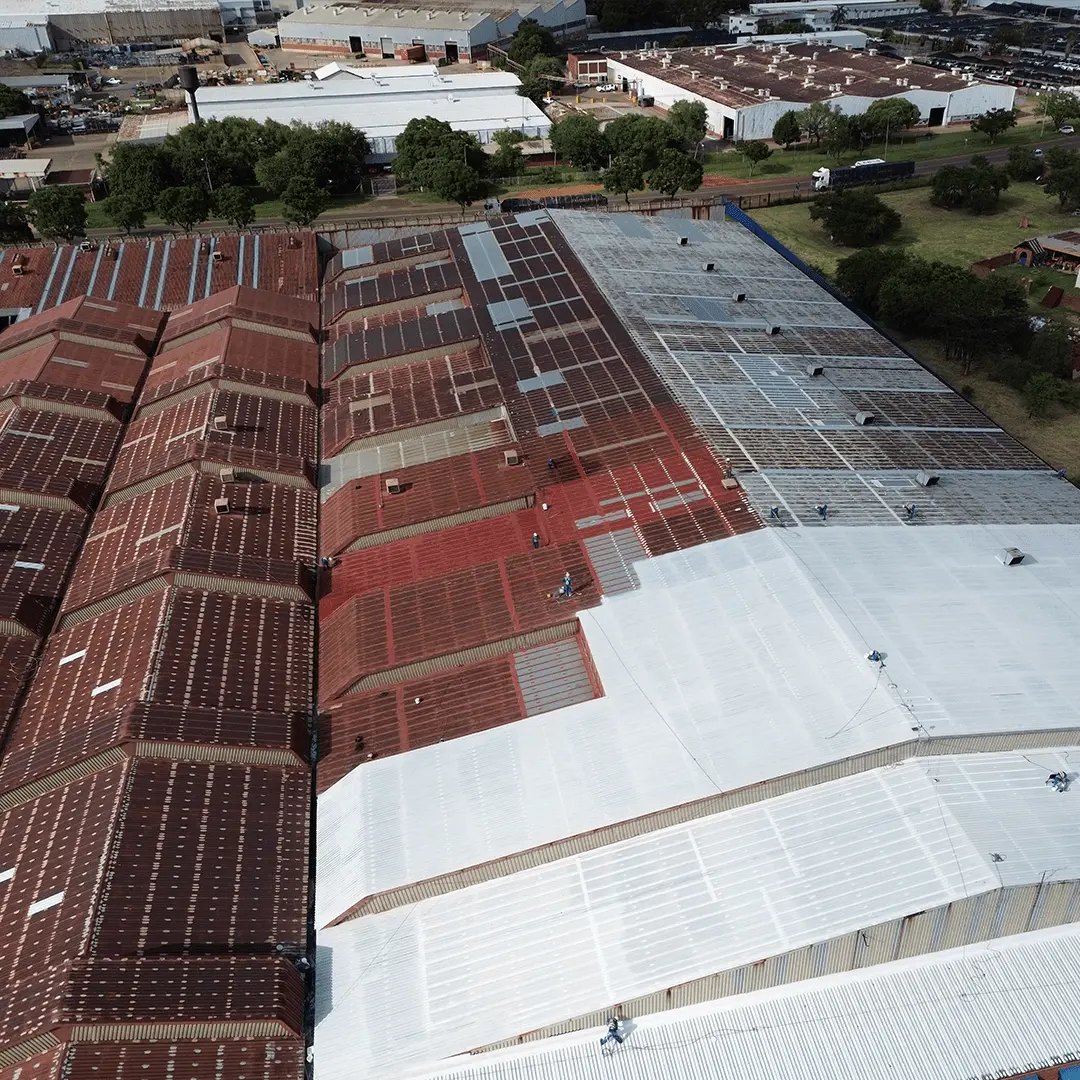 Industrial roof undergoing rust and corrosion protection with specialized coatings by Sicon Group